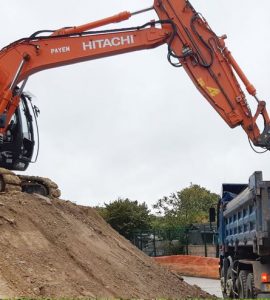 Terrassier avec camion belles pour Evacuation des terres et gravats issu de votre chantier de maison et de vos fondations